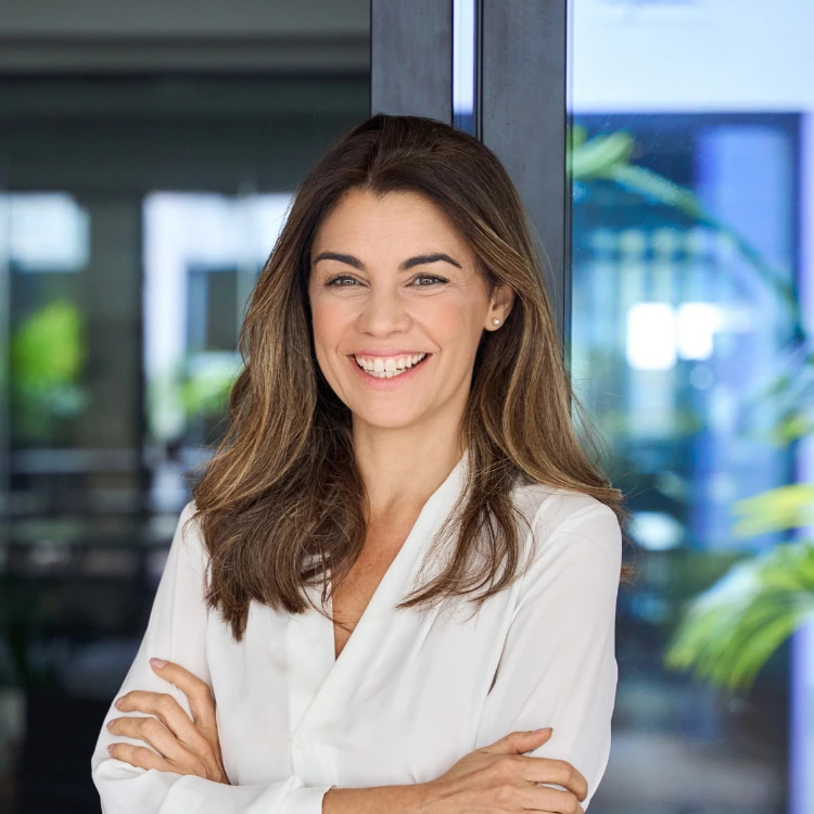 An event sponsor smiling to the screen