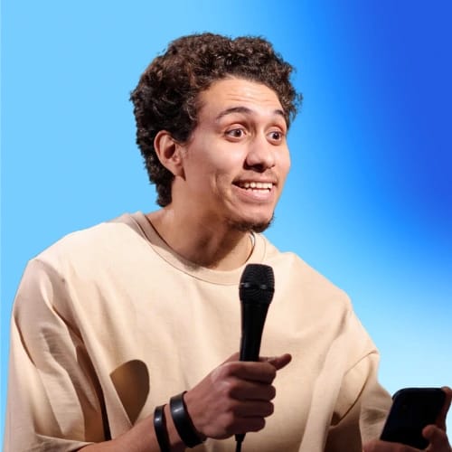 Standup comedian performing on stage