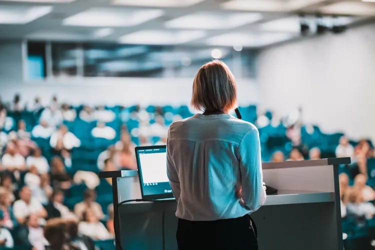 Professional presenting at a networking an interactive corporate event workshop.