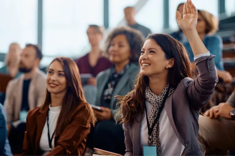 Professionals participating in a B2B event: interactive roundtable discussion with live Q&A and demos