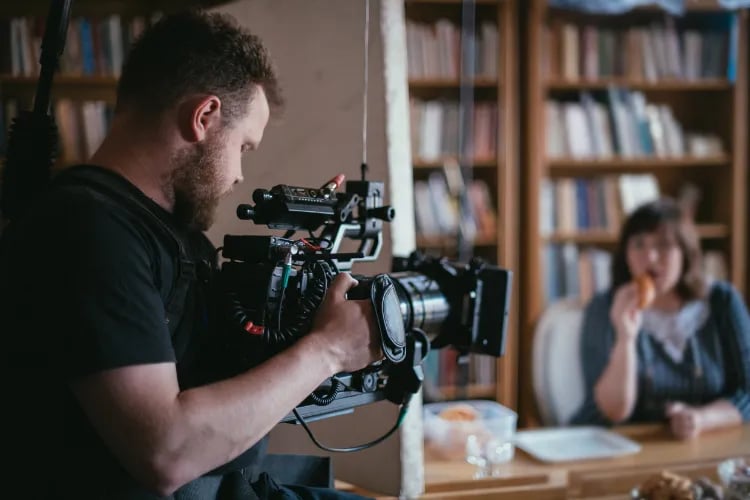 A videographer shooting a micro documentary