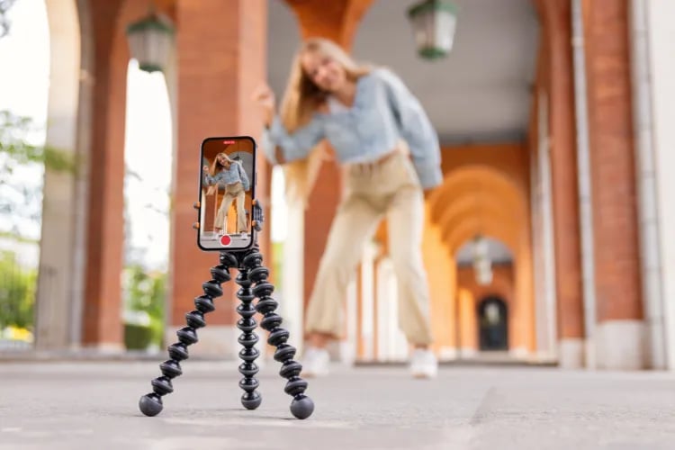 A girl filming a short TikTok video