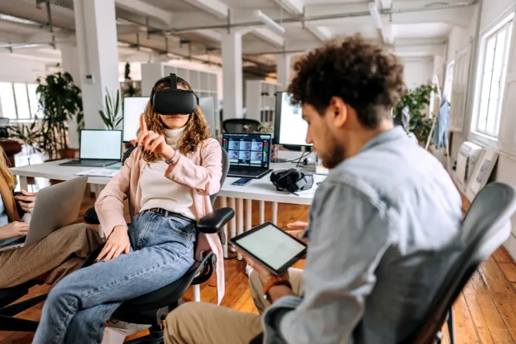 A woman wearing a VR headset to view a demo of a new product