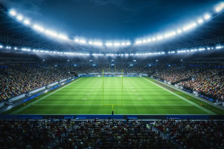 A packed sports stadium with fans scanning mobile tickets at entry gates