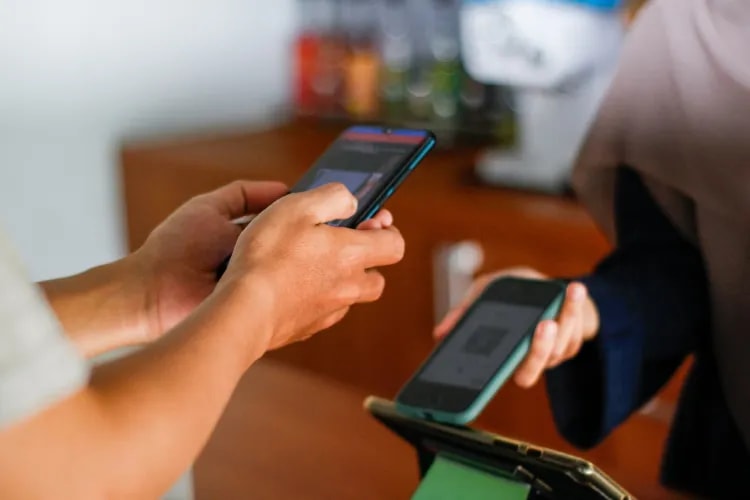 Attendee scanning a QR code ticket at an event entrance