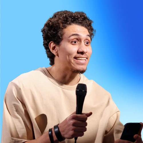 Standup comedian performing on stage